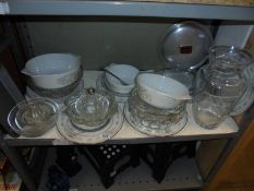 A shelf of assorted glass, pyrex etc.,