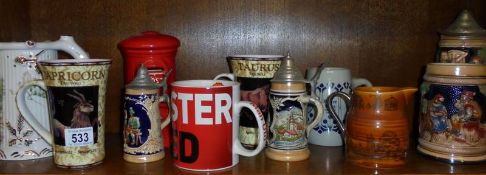 A mixed lot of tankards, beer steins, mugs etc.,