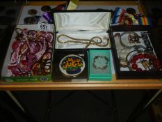 A good mixed lot of costume jewellery.