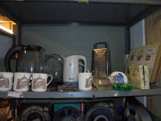 A shelf of assorted kitchenware.