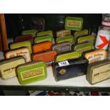 A quantity of old tobacco tins.