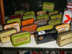A quantity of old tobacco tins.