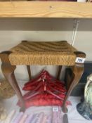 An Edwardian oak bedroom stool on Queen Anna legs & string weave seat