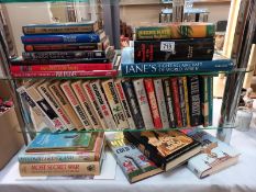 A quantity of books including Janes fighting aircraft of world war II, Lincolnshire windmills & good