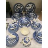 A Churchill England Blue Willow dinner service & including 3 pieces of English Iron stone