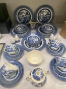 A Churchill England Blue Willow dinner service & including 3 pieces of English Iron stone