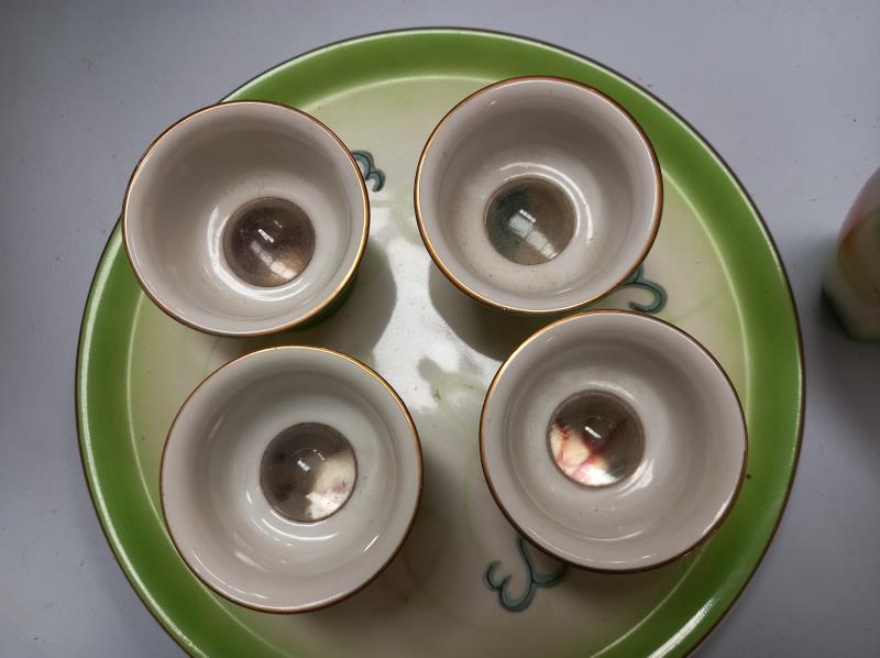 A Japanese SAKI moon flask with 4 cups with magnifying bottoms on tray - Image 4 of 4