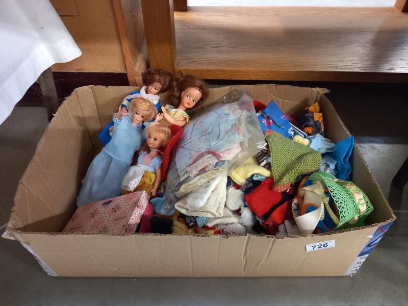 A box of Sindy/Barbie STYLE/type Dolls with clothing