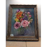 A vintage gilt framed oil on canvas still life of vase of flowers