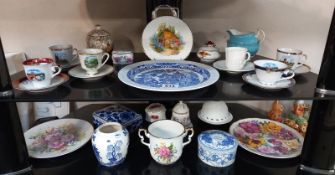 2 shelves of miscellaneous china including blue willow cups and saucers etc