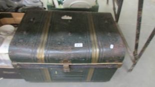 An early 20th century tin steamer trunk, COLLECT ONLY.