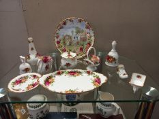 A quantity of Royal Albert Country Rose ornaments etc
