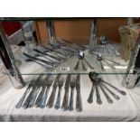 A quantity of Kings pattern cutlery 6 large knives & forks, 5 small knives & forks, 6 dessert