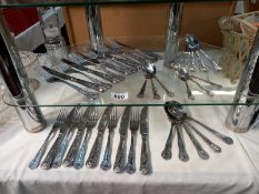 A quantity of Kings pattern cutlery 6 large knives & forks, 5 small knives & forks, 6 dessert