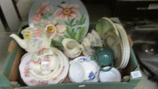 A mixed lot of miscellaneous ceramics including teapot, plates etc.,