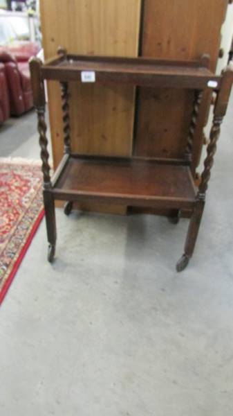 An 1930's oak tea trolley. COLLECT ONLY.