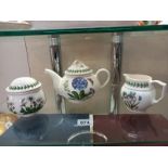 A Port Meirion teapot, sugar bowl and milk jug