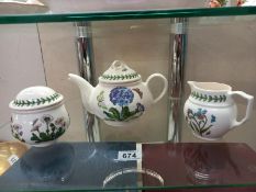 A Port Meirion teapot, sugar bowl and milk jug