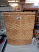 A lined reeded linen basket, COLLECT ONLY.