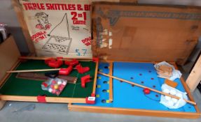 A vintage table top snooker and table skittles/bagatelle games