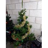 A 6 foot tall Christmas tree with decorations. COLLECT ONLY.
