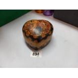 An oriental style heart shaped pottery trinket box