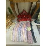 A selection of vintage style covered coat hangers