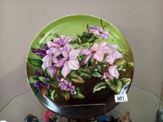 A large floral wall/cabinet plate diameter 37cm
