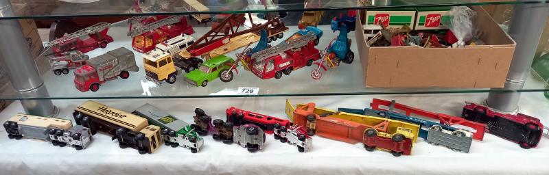 A box of play worn die cars including Matchbox, Corgi etc. Including Spiderman bike, Easy rider