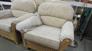 A good quality cane/bamboo lounge suite with coffee table. COLLECT ONLY.