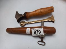 A vintage brass pastry cutter, a barrel tap & 1 other item