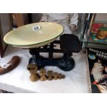 Vintage cast iron kitchen scales with enamel pan and brass weights