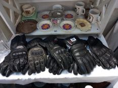 A selection of used motorcycle gloves, size L and XL