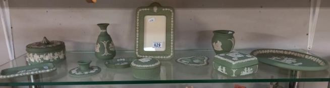 A good collection of green Wedgwood Jasperware, including picture frame