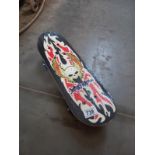 A Skulls skateboard