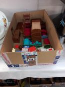 A quantity of vintage dolls house furniture