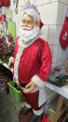 A 5 foot tall Santa Clause automaton, no lead and untested so working condition not known.