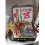 A vintage suitcase containing a good lot of sheet music