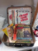 A vintage suitcase containing a good lot of sheet music