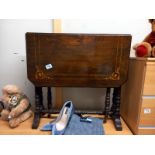 An inlaid Edwardian mahogany Sutherland table