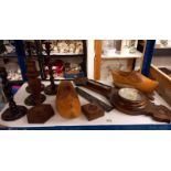 A barometer, clogs and wooden candlesticks.