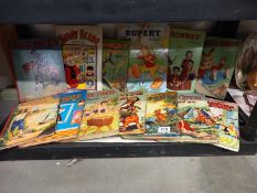 A quantity of vintage annuals including Rupert.