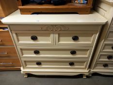 A good quality 2 over 2 white/cream chest of drawers