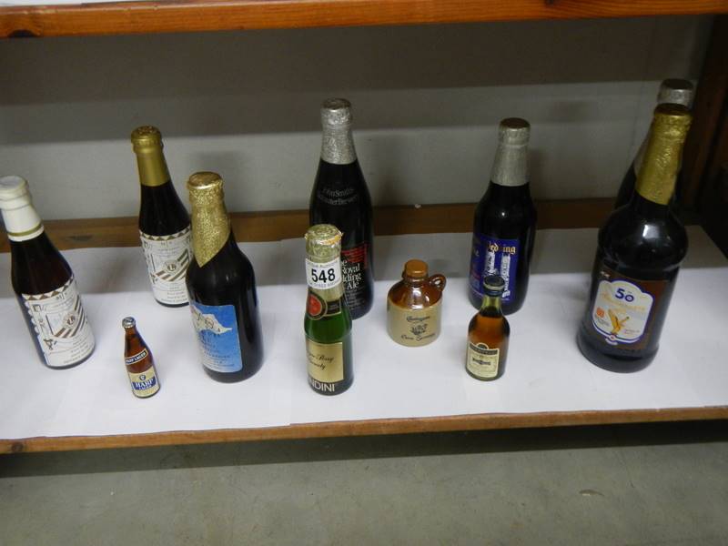 A quantity of small bottles of alcohol including wine.