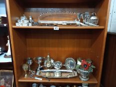 A good selection of silver plated items (2 shelves)