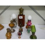 A selection of small oil lamps.