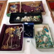 A good lot of costume jewellery including boxe Swarovski necklace and earrings.