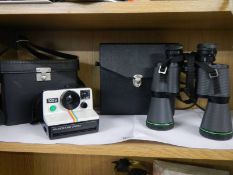 A pair of binoculars and a camera.