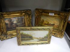 Three gilt framed pictures.