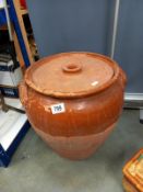 A large lidded terracotta pot, 37cm x 41cm high (COLLECT ONLY)